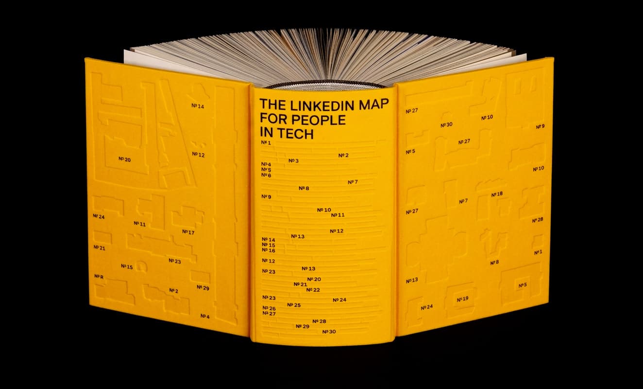 The LinkedIn Map opened flat, the chapter map blind-embossed across both boards and the spine